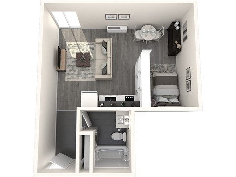 a bedroom with a bed and a chair in a small room